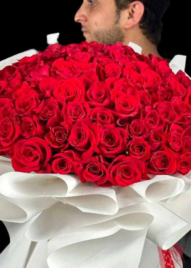 100 Red Roses – White Wrapped Valentines Special  Florists in Dubai Delivery