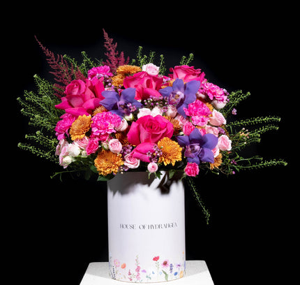 Box of pink roses with dream of gardens