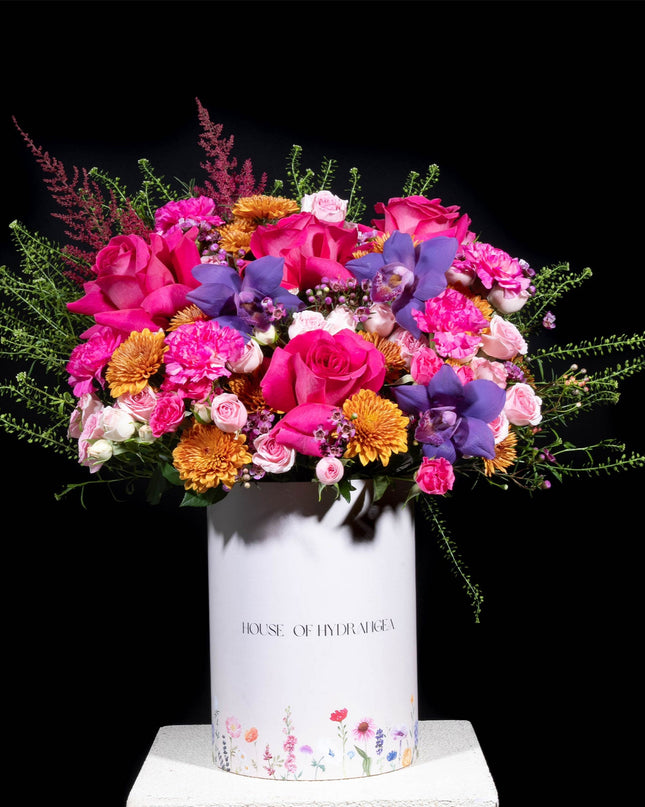 Box of pink roses with dream of gardens