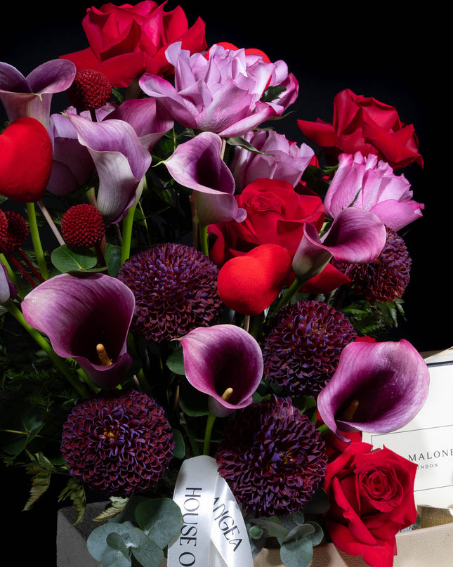 Jo Malone with purple promogrante bouquets