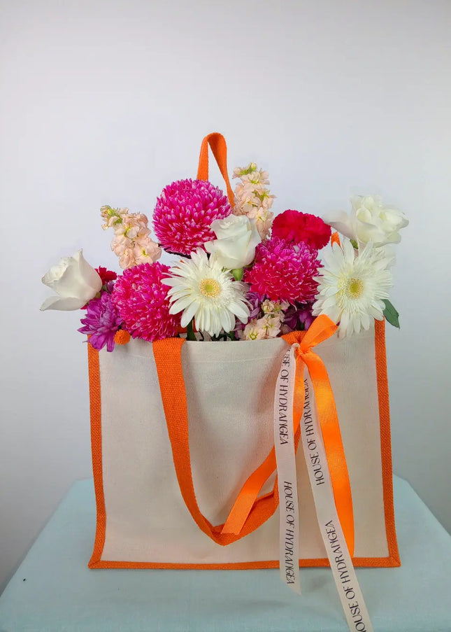 Upscale Tangerine beach bloom | Blooms Flower Delivery  in Dubai