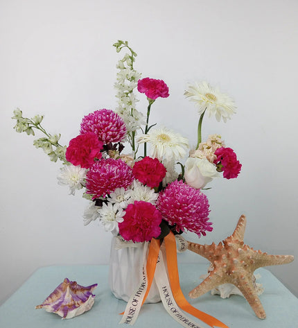 Exclusive Tangerine beach vase Flowers Premium Flower Delivery in Dubai